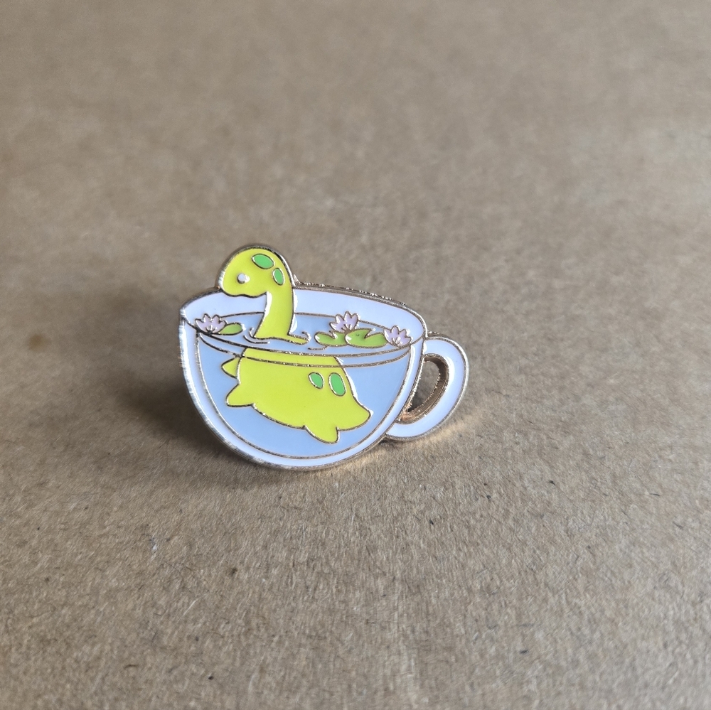 Cute Dinosaur in Teacup Enamel Pin